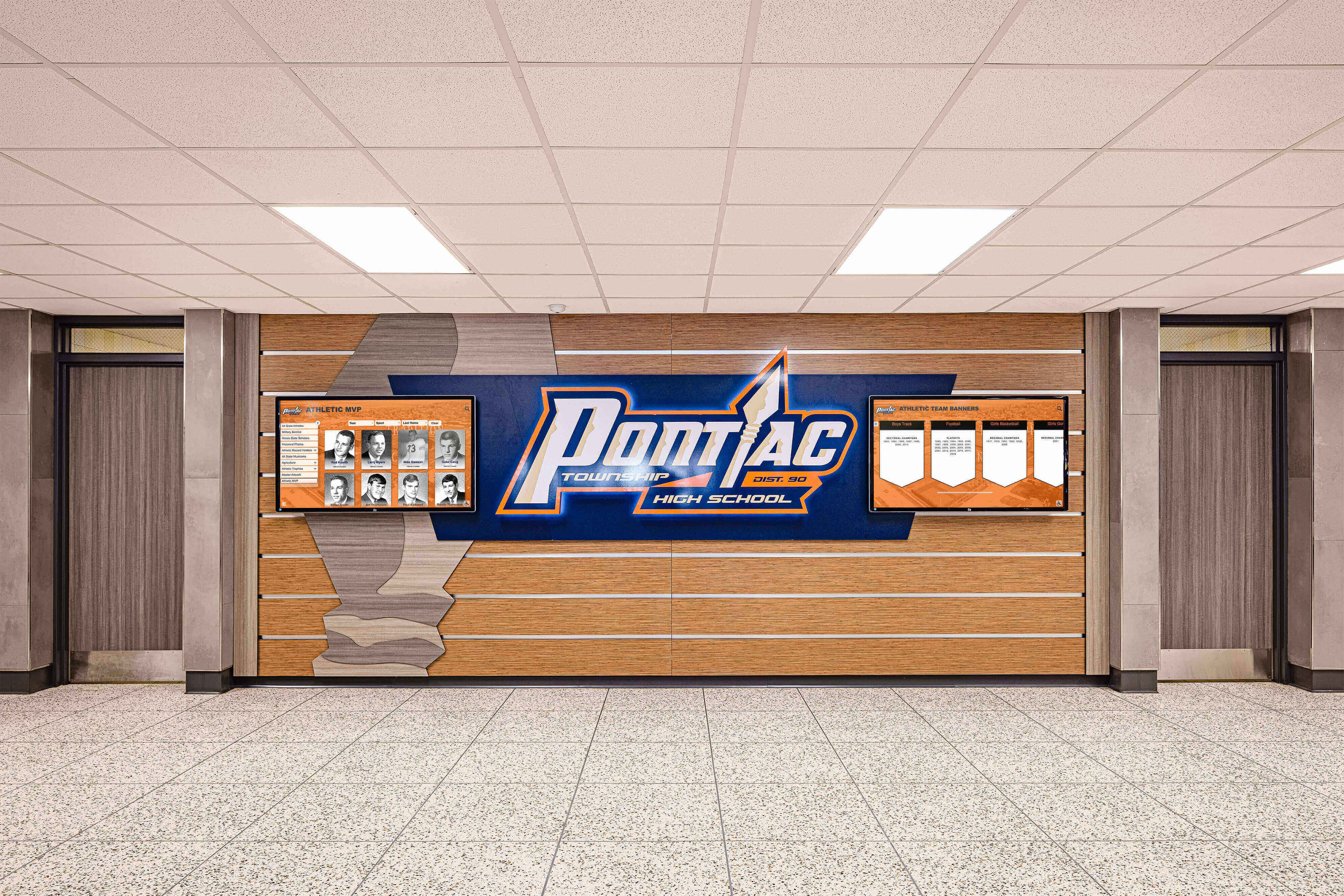 pontiac high school hallway logo athletic honor boards